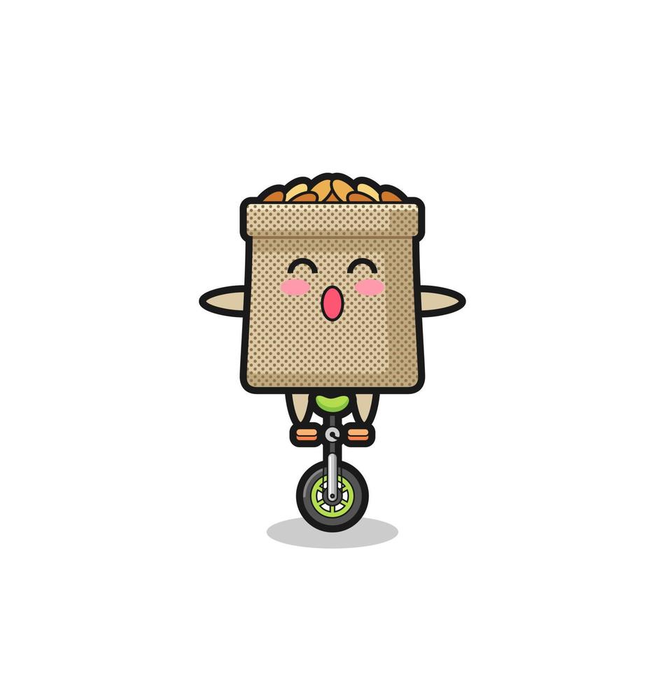 The cute wheat sack character is riding a circus bike vector