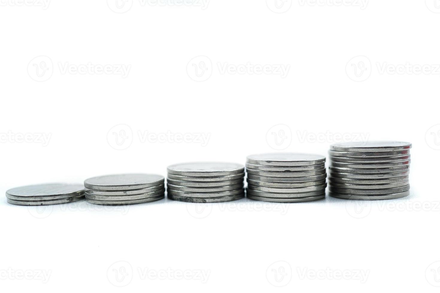 coins scattered and in the middle it says Recession. photo