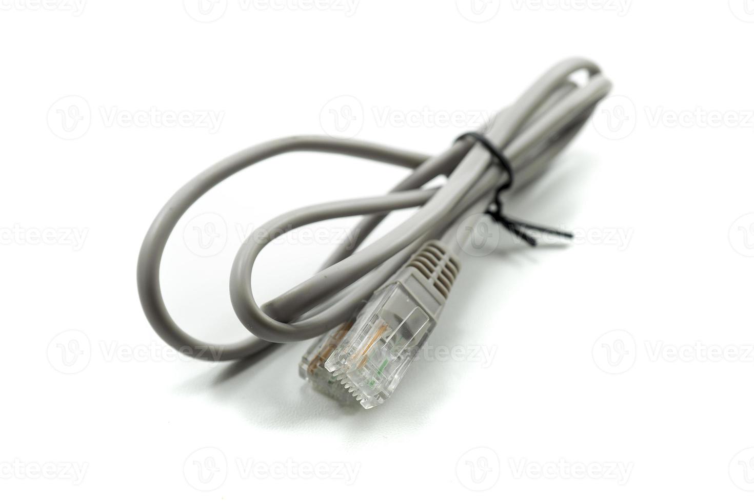 Gray LAN network connection ethernet cable. Internet cord RJ45 isolated on white photo