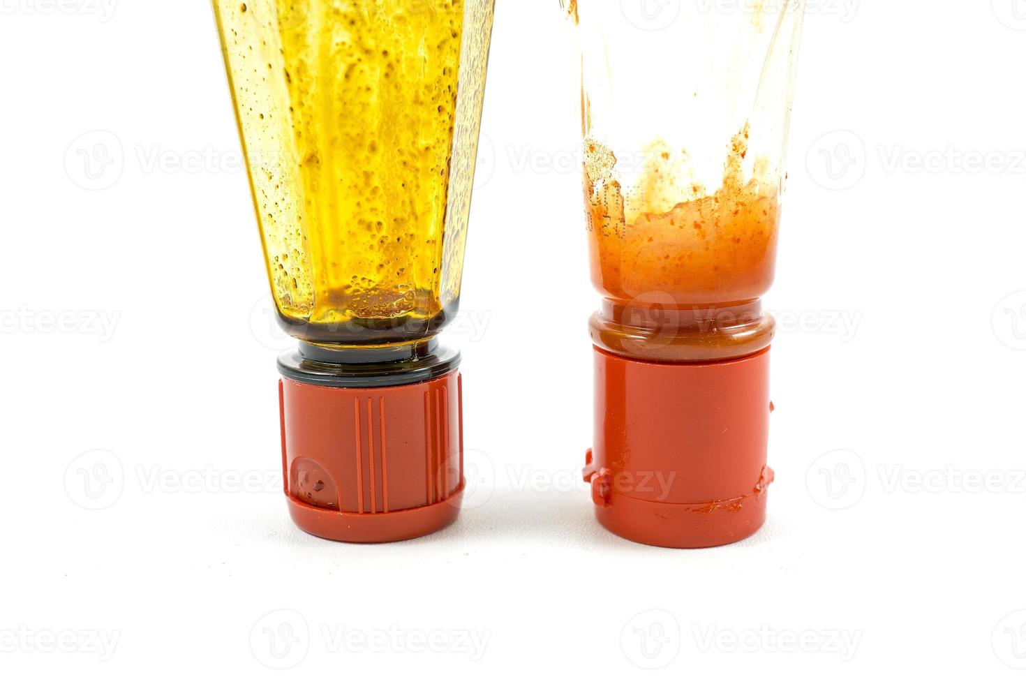 soy sauce and ketchup bottles overturned because they were almost empty photo
