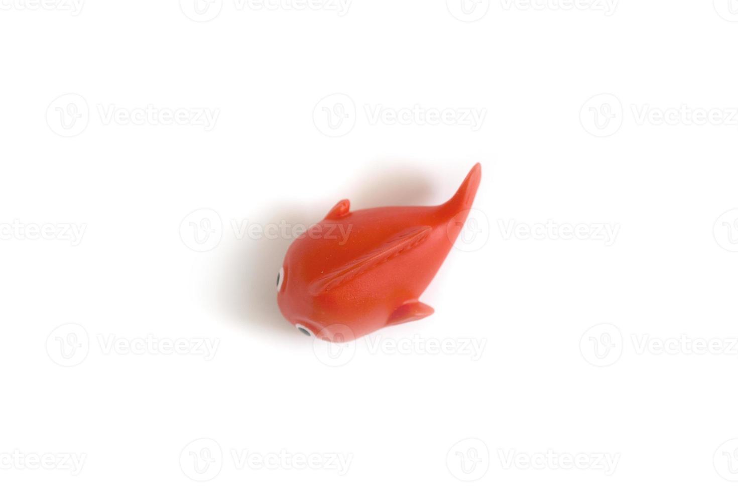 red rubber fish toddler toy used to play when bathing photo