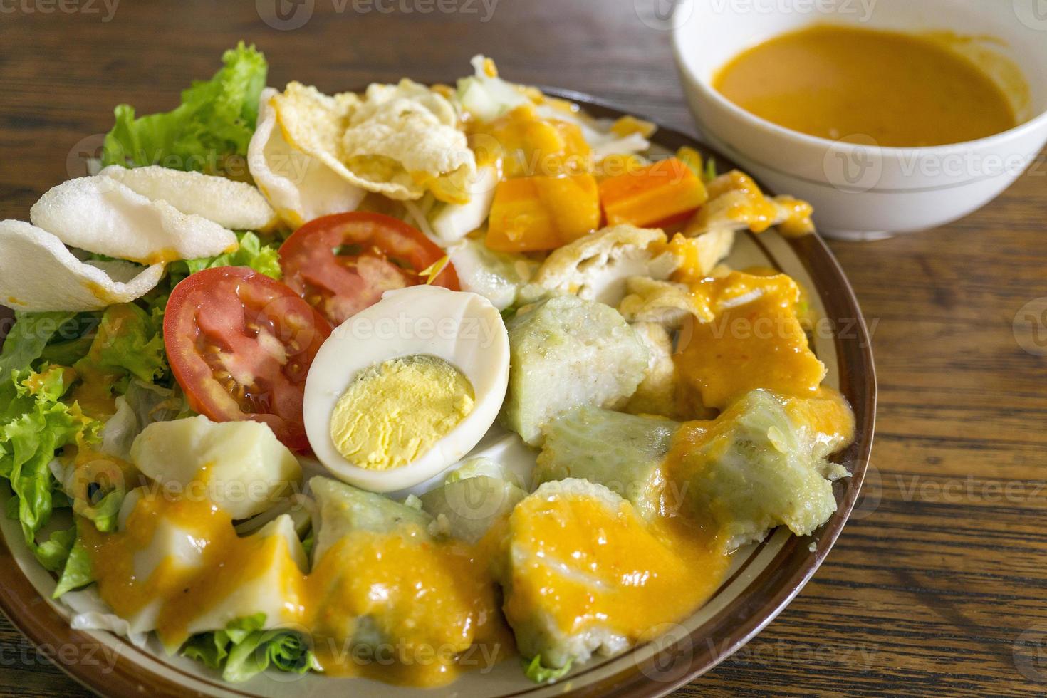 GADO-GADO is a typical Indonesian food containing boiled vegetables photo