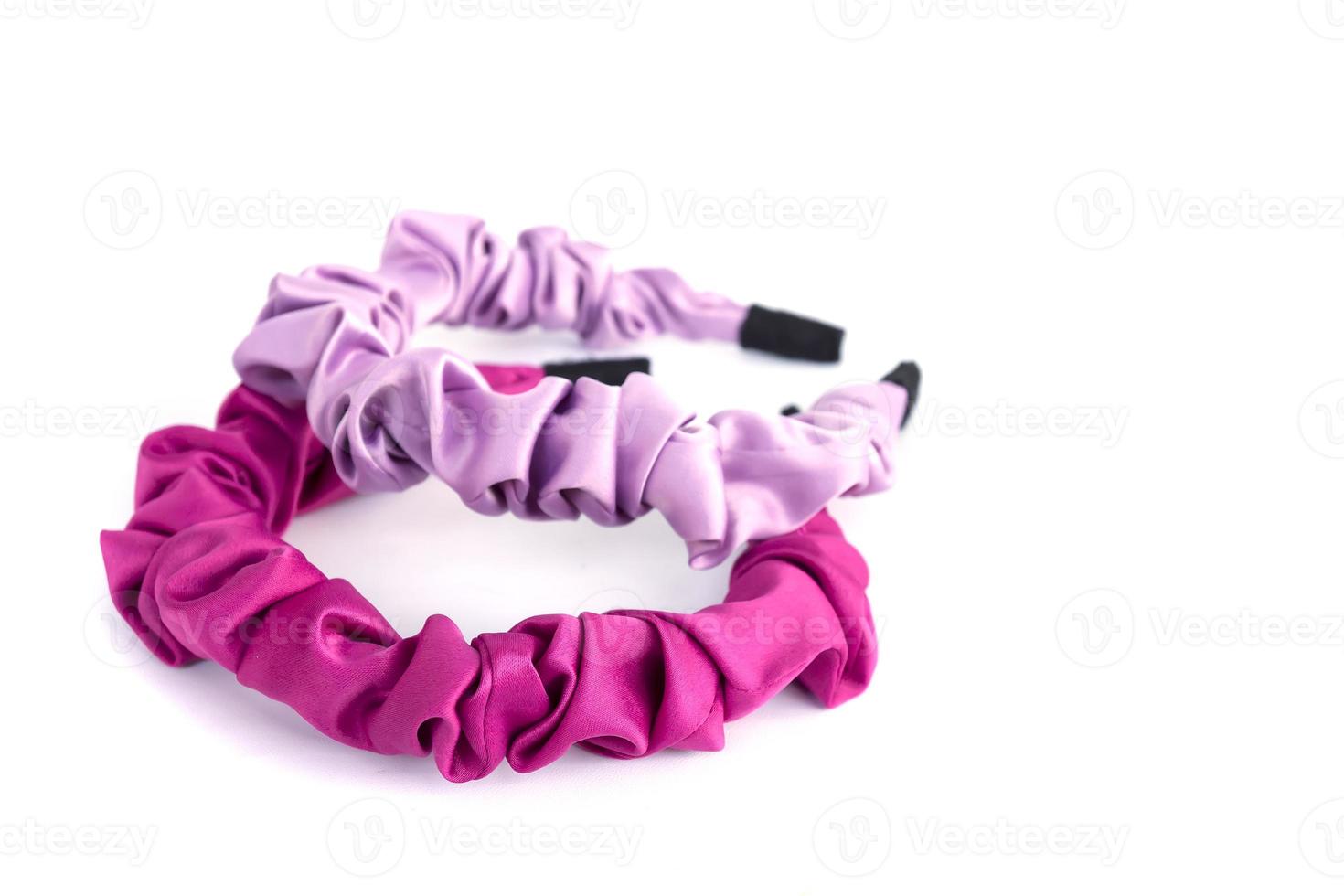 Beautiful luxury red and pink headband made of plastic covered in soft cloth photo