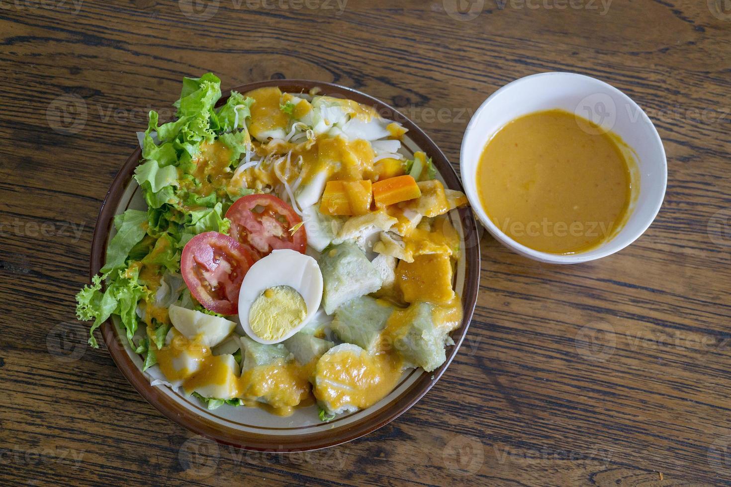 GADO-GADO is a typical Indonesian food containing boiled vegetables photo