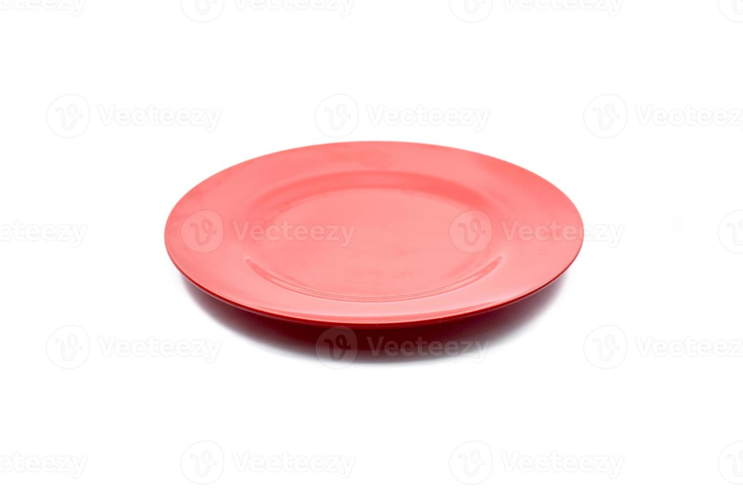 empty plastic red plate isolated on white background. photo