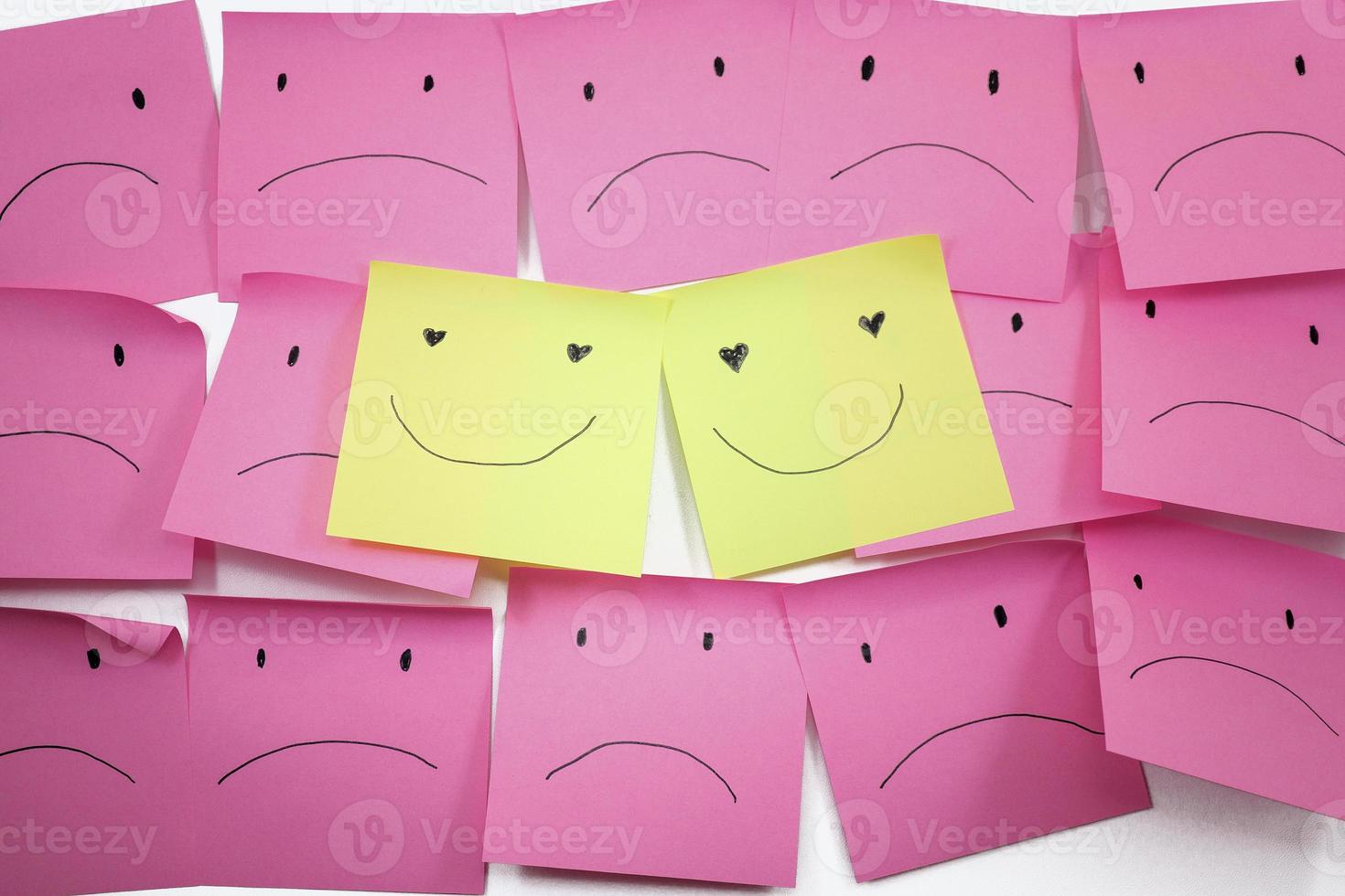 conceptual image for happy couple among unhappy community with the couple. photo