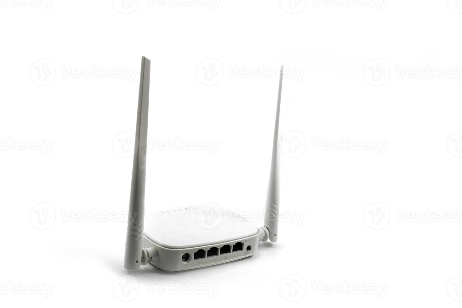 White wireless internet router with two antennas isolated on white photo