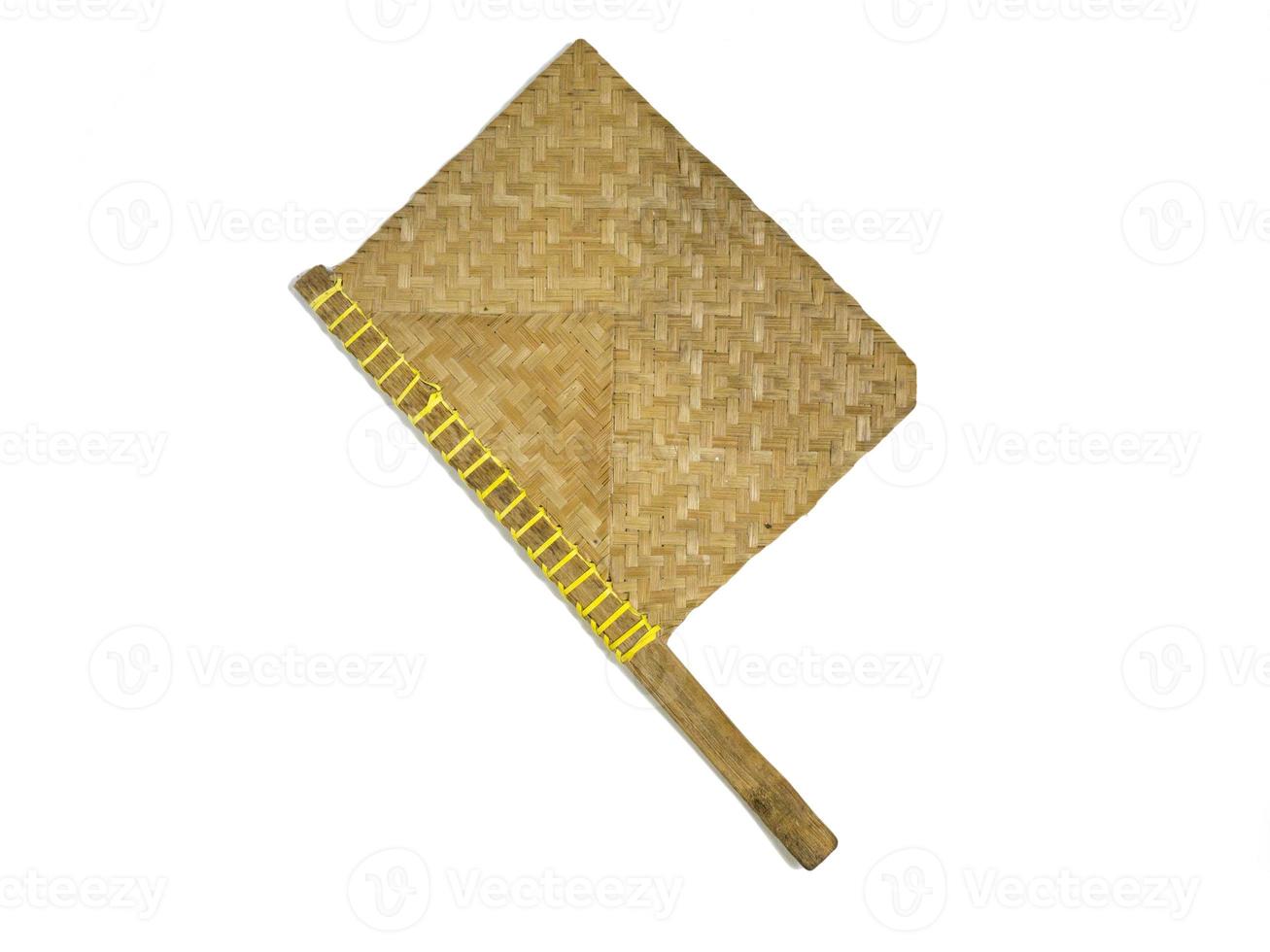 handheld fan made of bamboo used for grilling satay isolated on a white photo