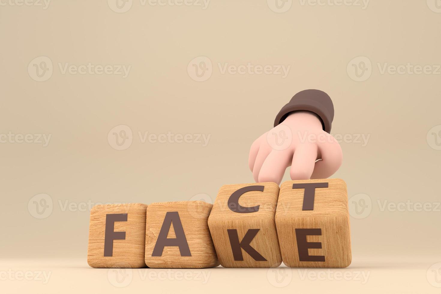 Hand turns dice and changes the word fake to fact. photo