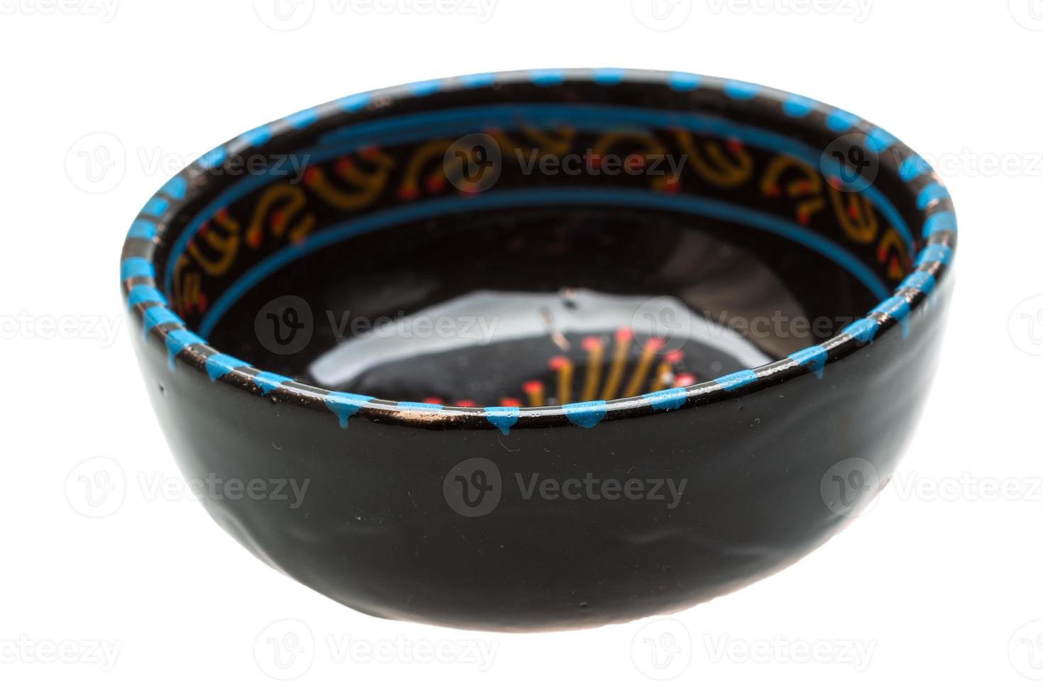 Black bowl on white background photo