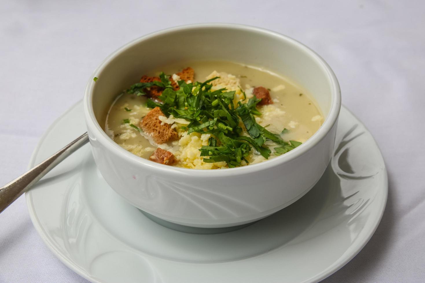 Cereal soup on white background photo