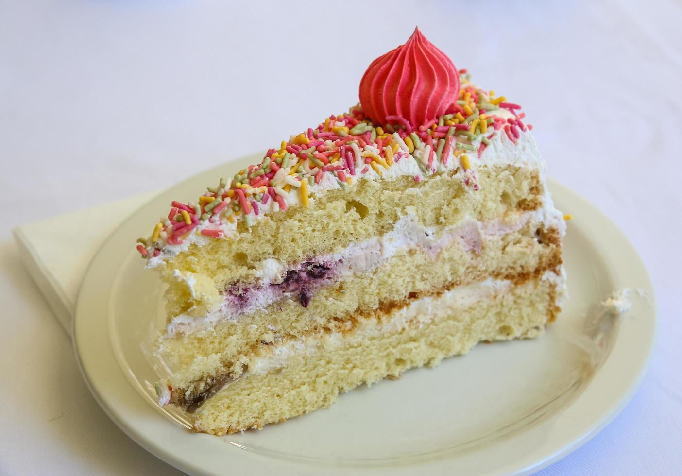 Fresh cake on white background photo