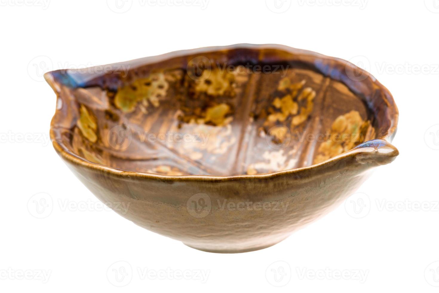 Empty ceramic bowl on white background photo