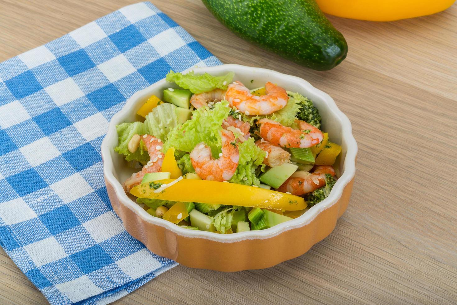 Salad with shrimps and avocado photo