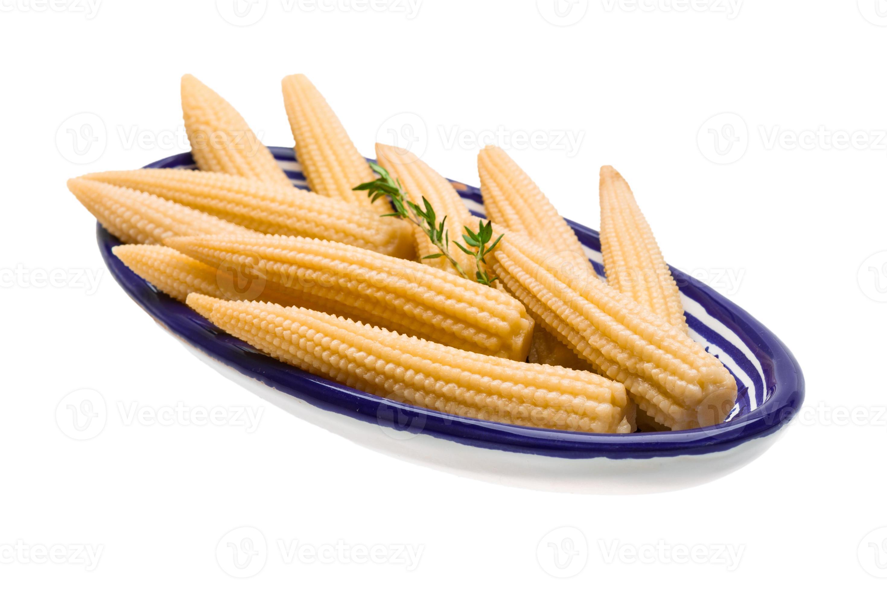 Baby corn in a bowl on white background 12061715 Stock Photo at Vecteezy