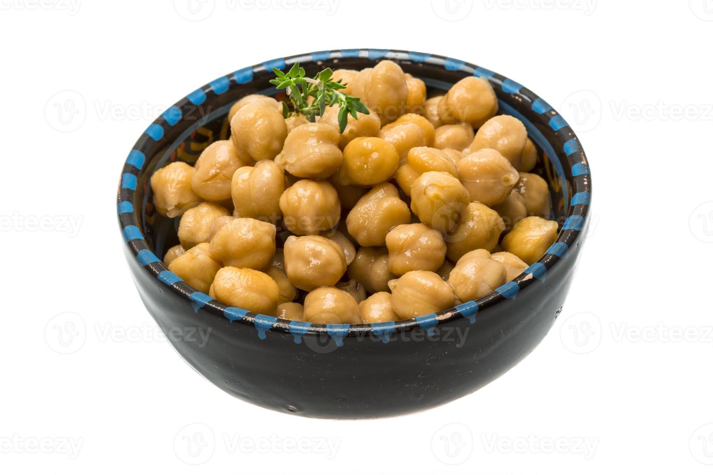 Peas nut in a bowl on white background photo