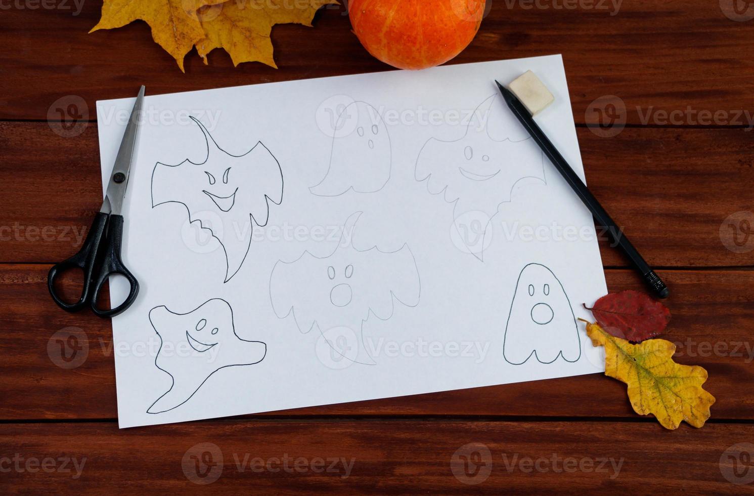 Halloween DIY. Step by step instructions on how to draw funny ghosts. photo
