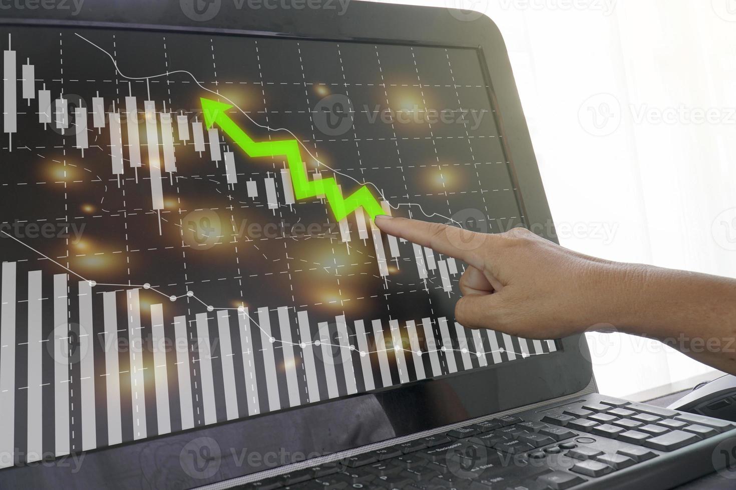 The screen shows an uptrend graph. photo