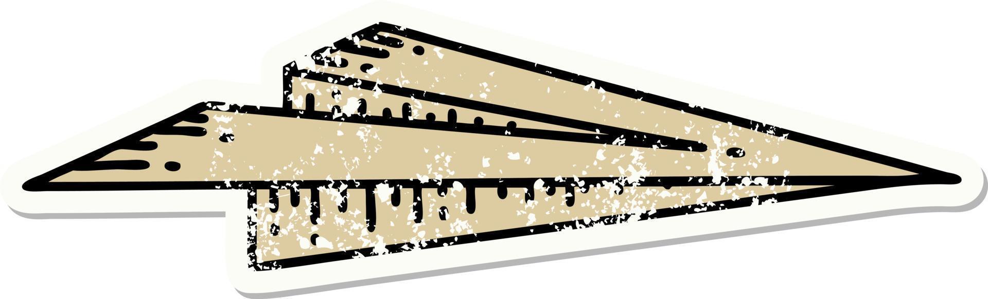 distressed sticker tattoo in traditional style of a paper airplane vector