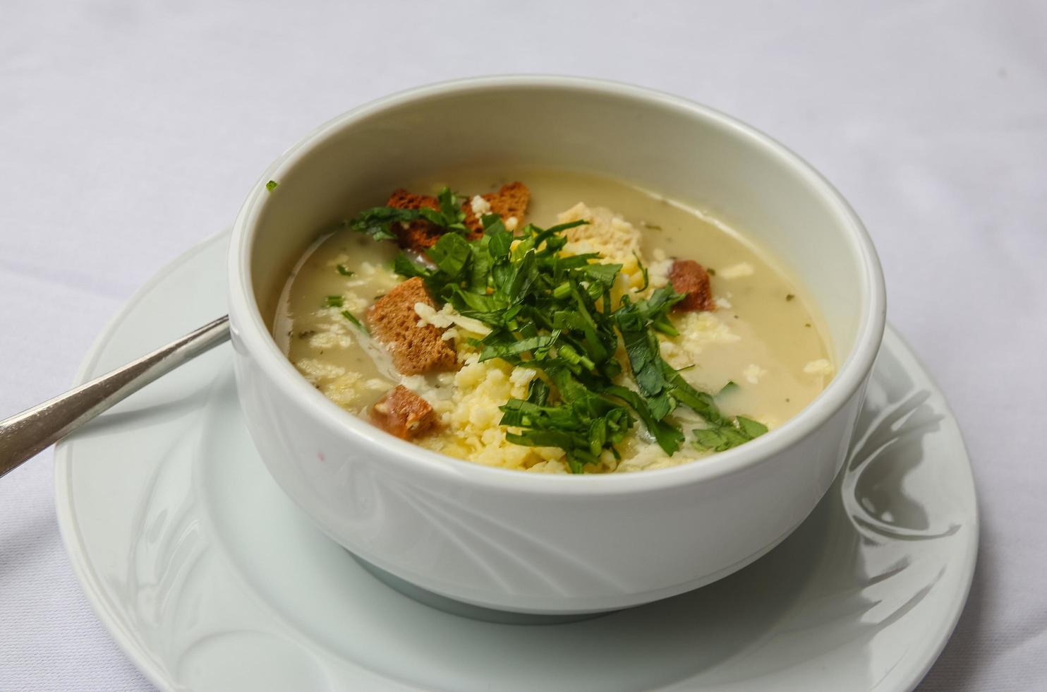 Cereal soup on white background photo