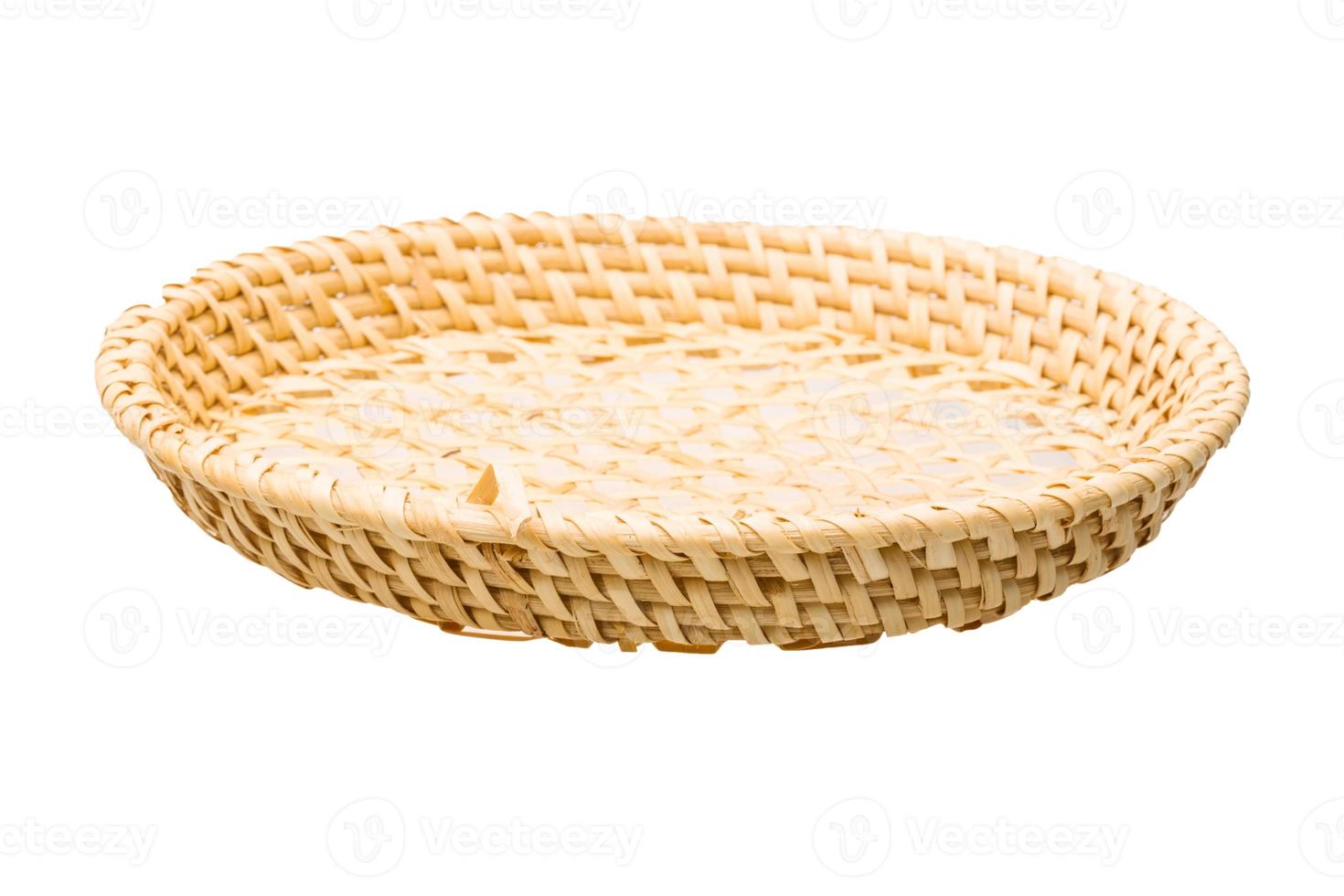 Wooden basket on white background photo