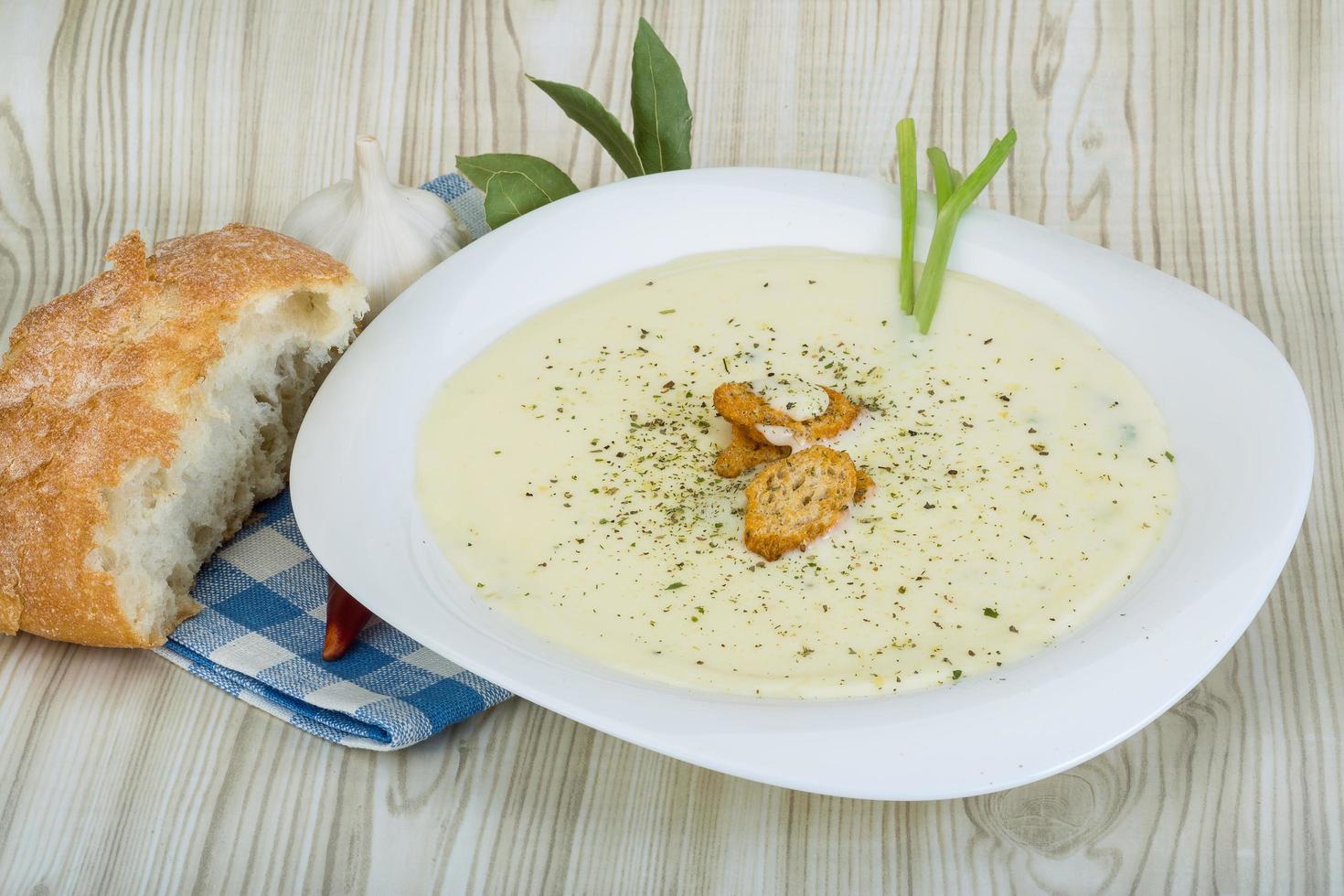 Cheese soup with croutons photo