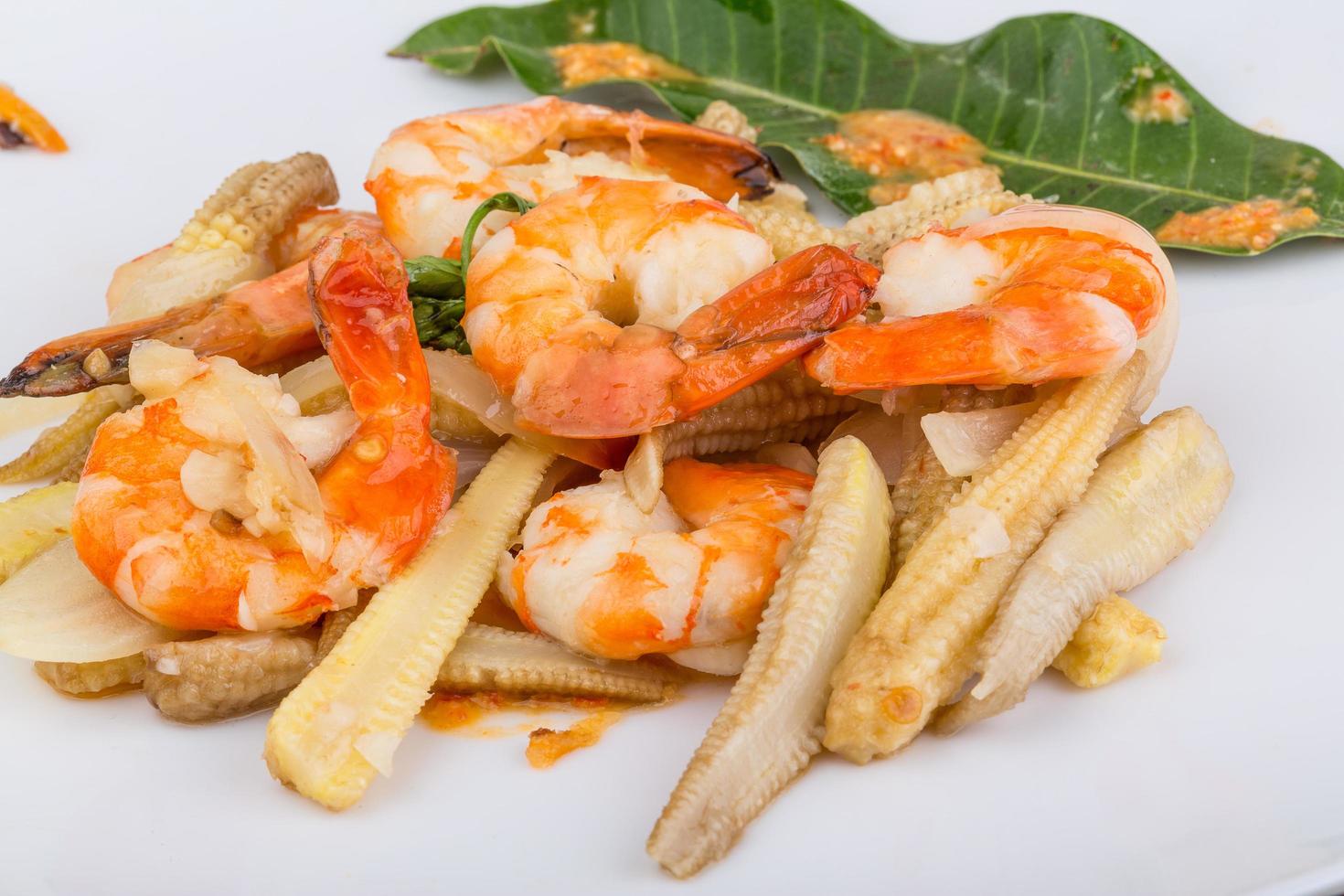 Shrimp and corn salad on the plate photo