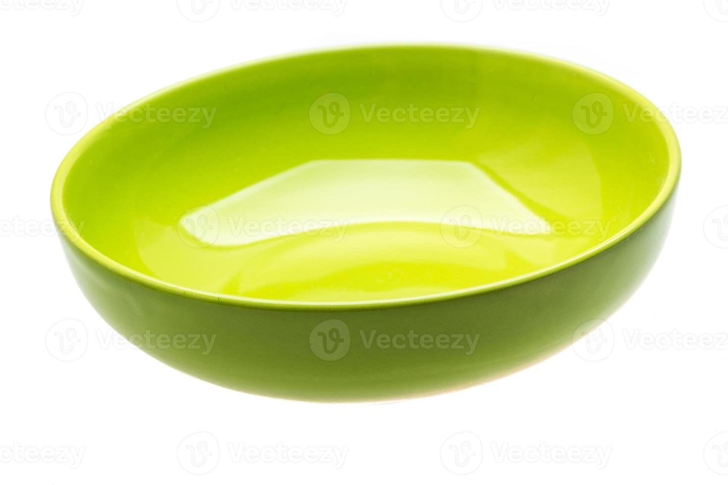 Empty ceramic bowl on white background photo