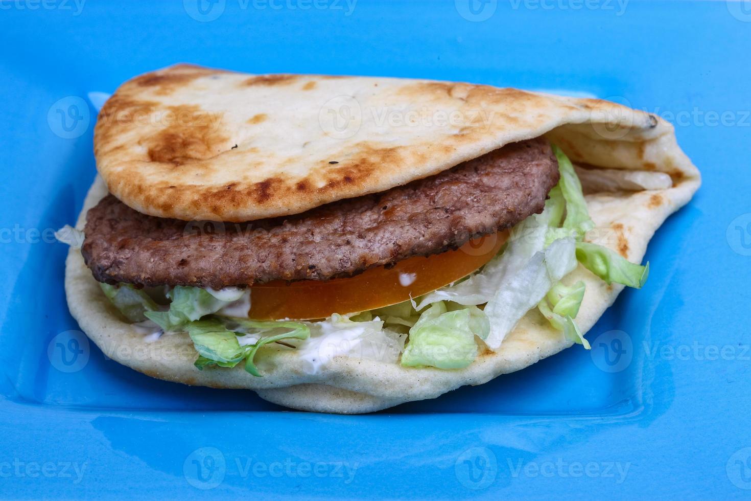 Greek pita on the plate photo