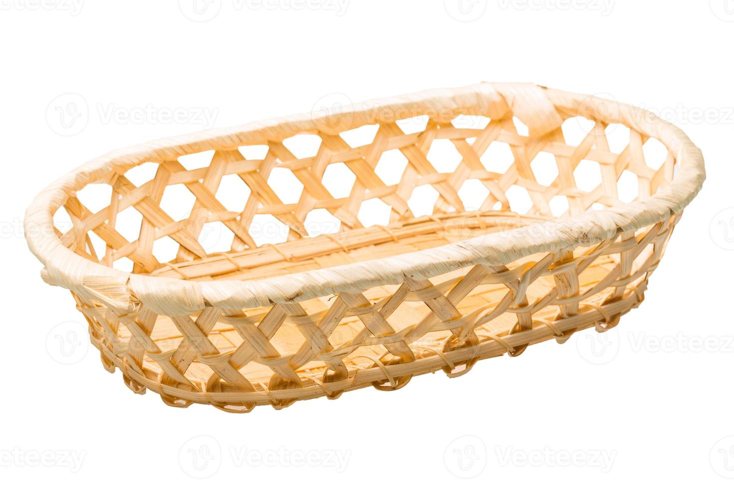 Wooden basket on white background photo