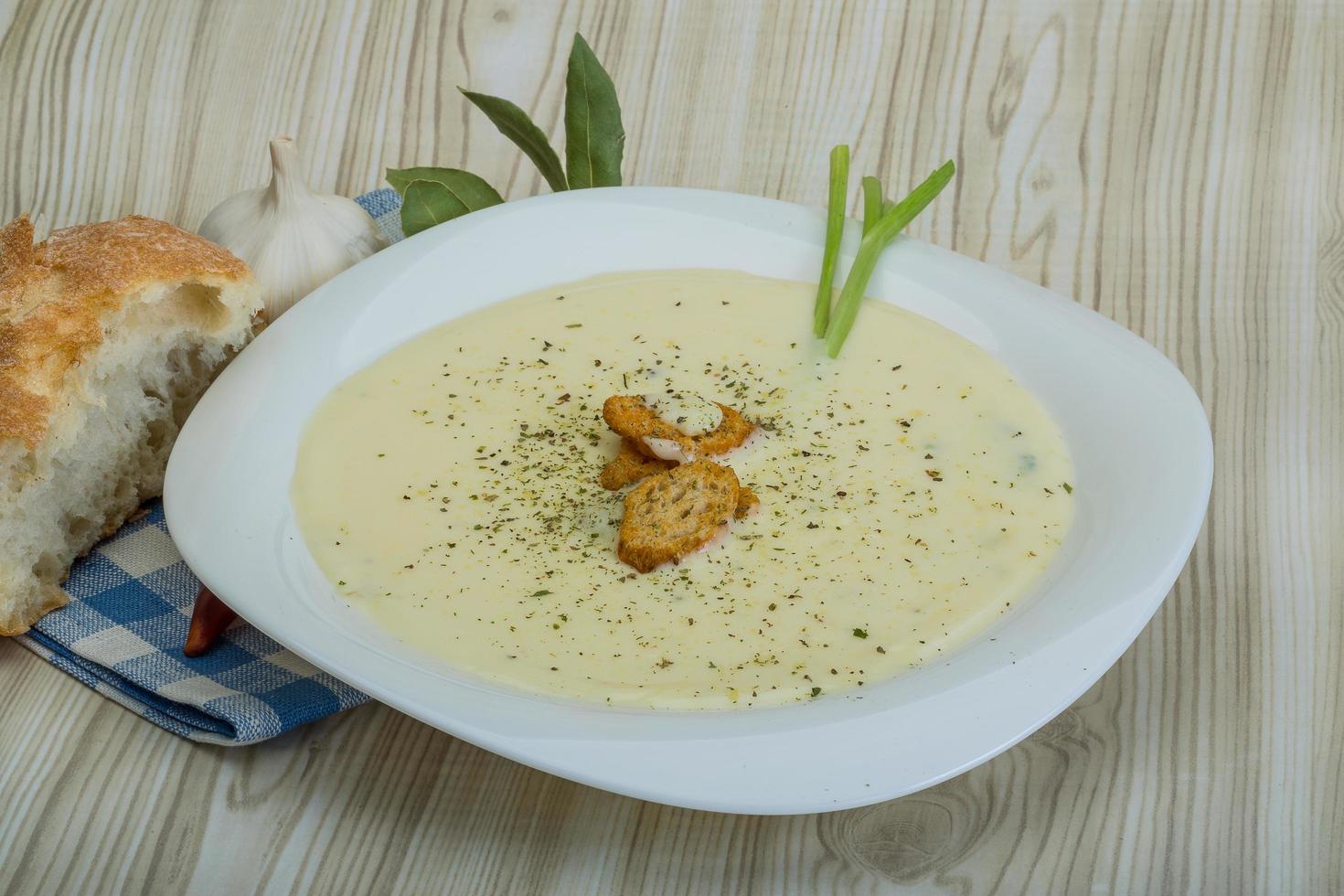 Cheese soup with croutons photo