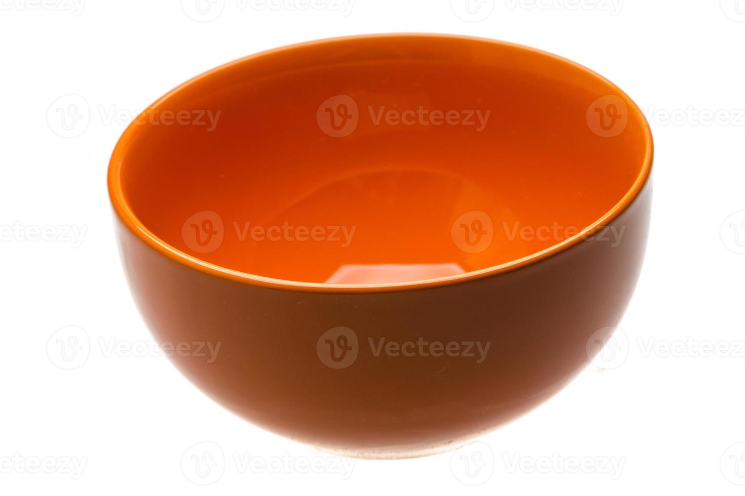 Empty ceramic bowl on white background photo