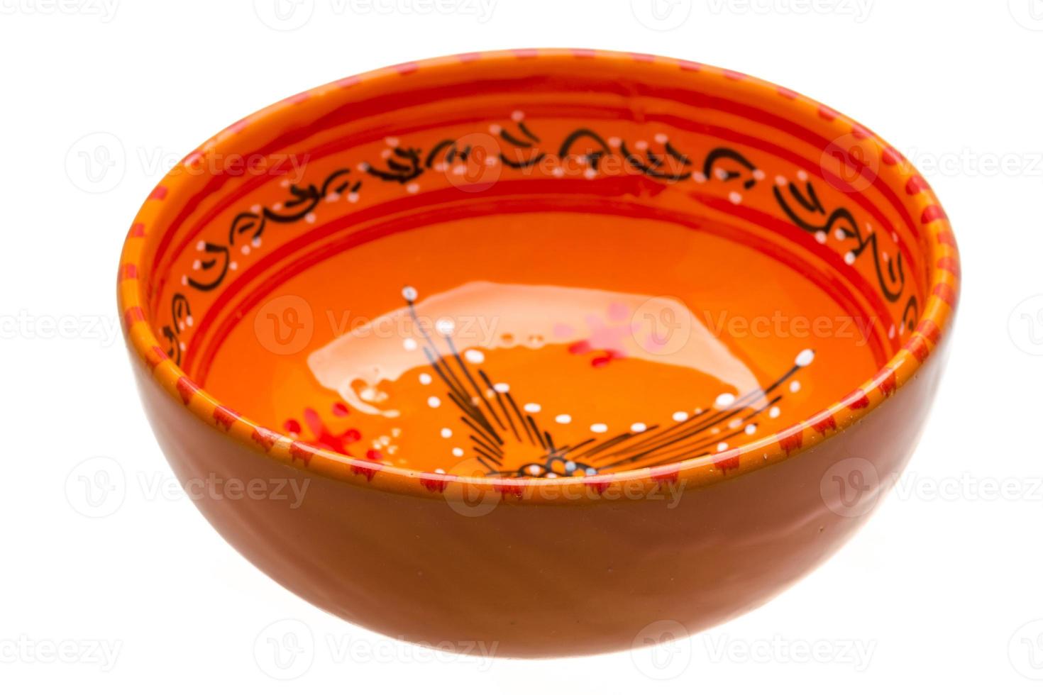 Empty ceramic bowl on white background photo