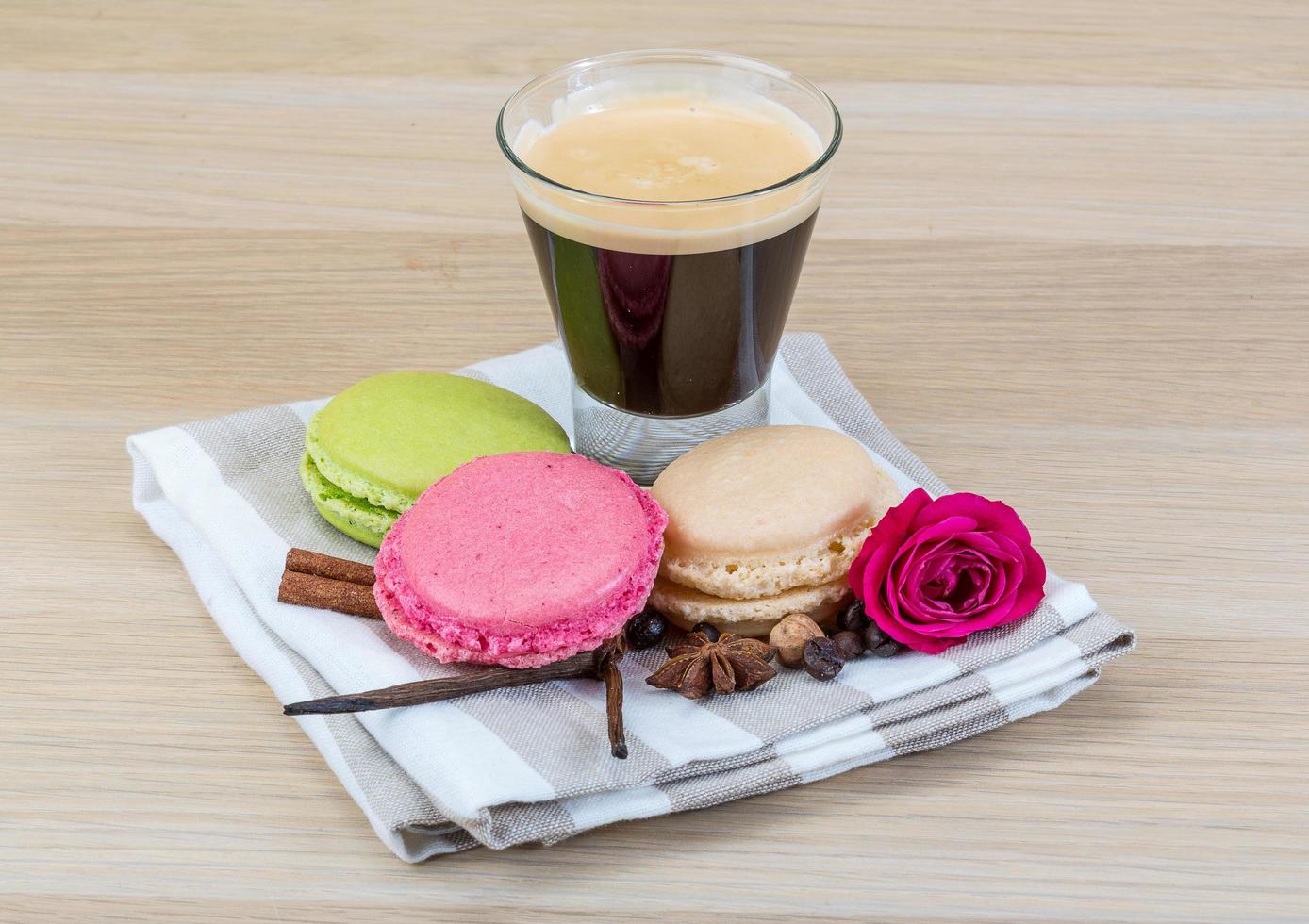 Macaroons delicious on wooden background photo