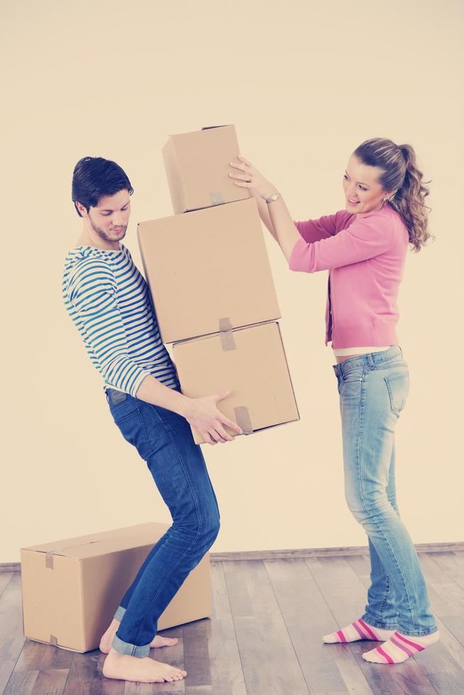 Young couple moving in new house photo