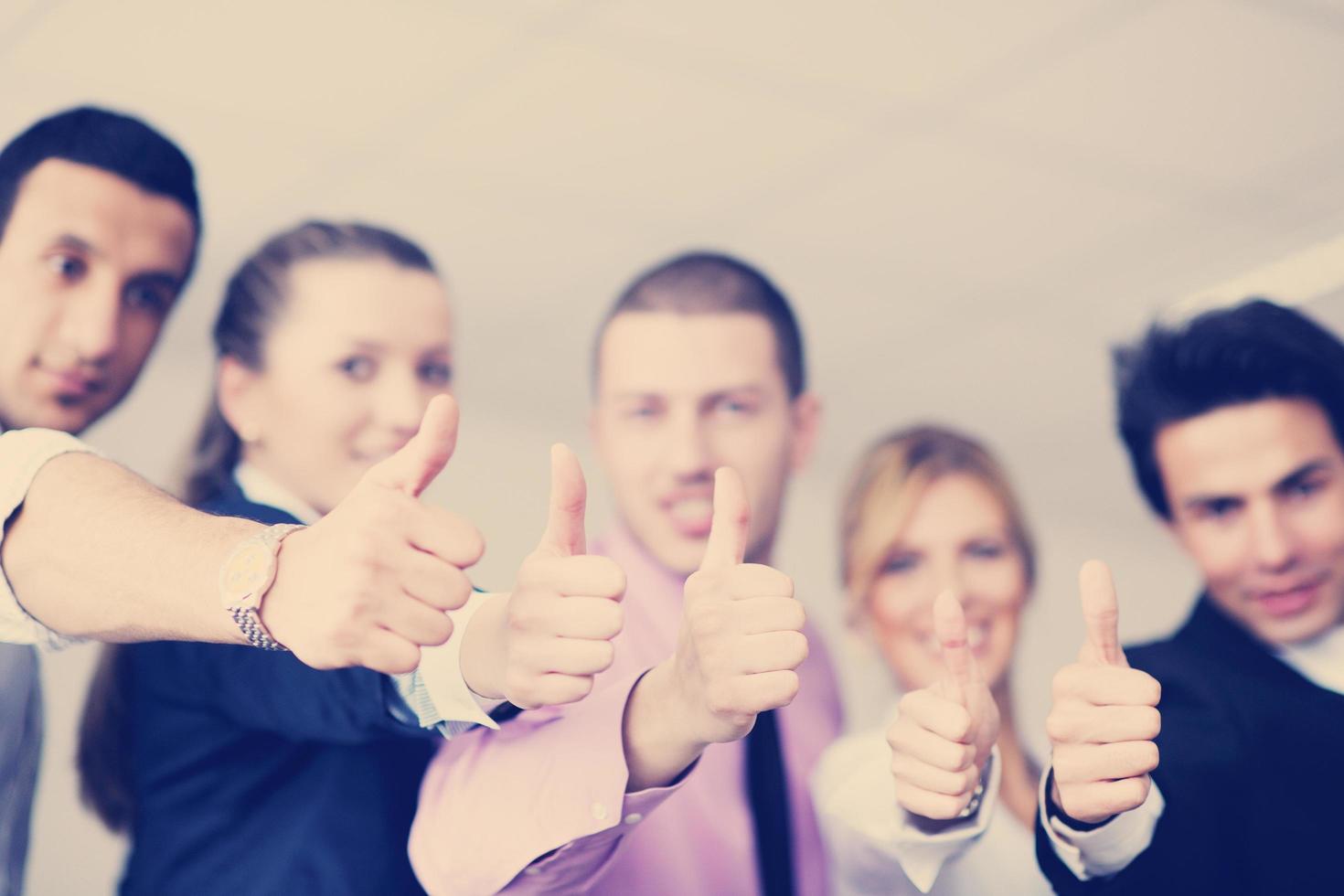 Group of young business people at meeting photo