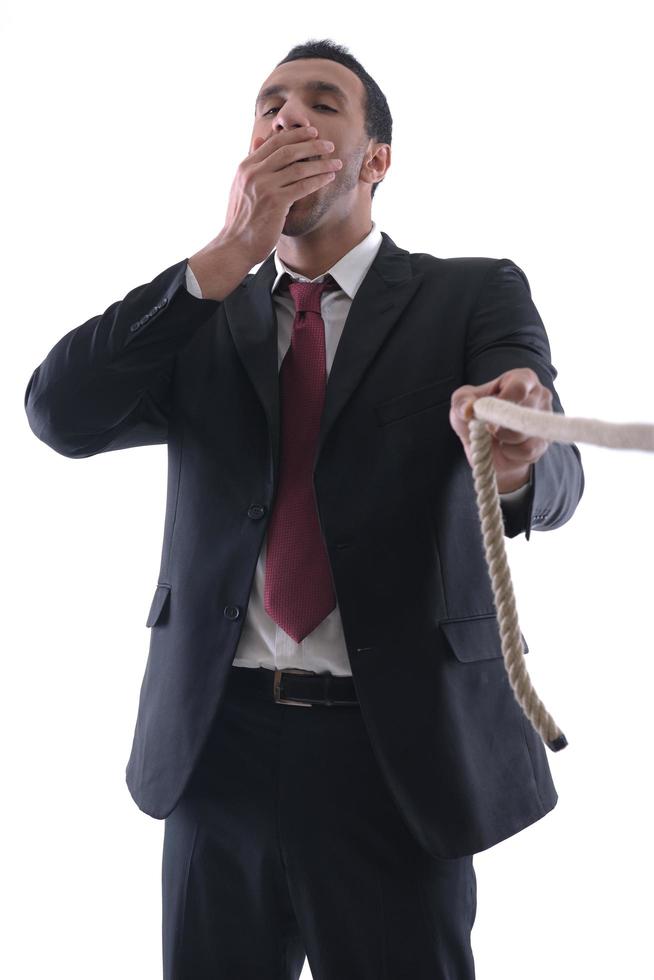 business man with rope isolated on white background photo