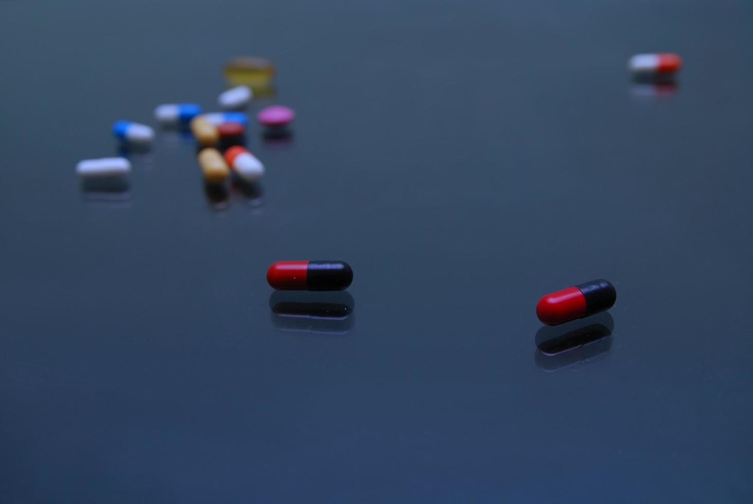 pills on glosy surface photo