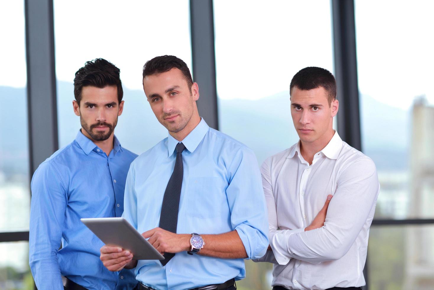 business man using tablet compuer at office photo