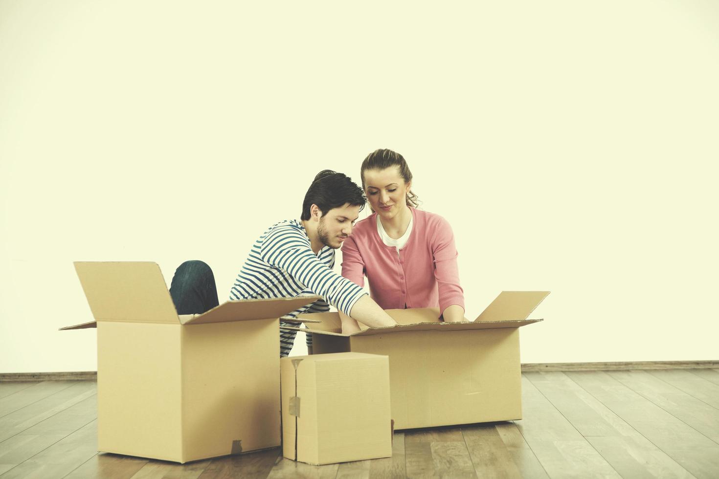 Young couple moving in new house photo