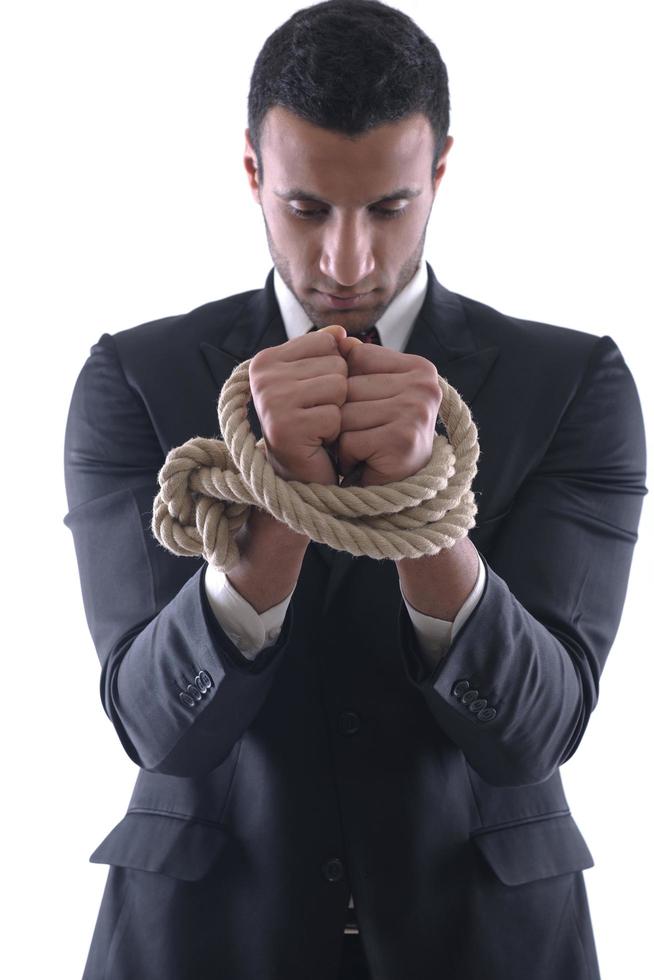 business man with rope isolated on white background photo