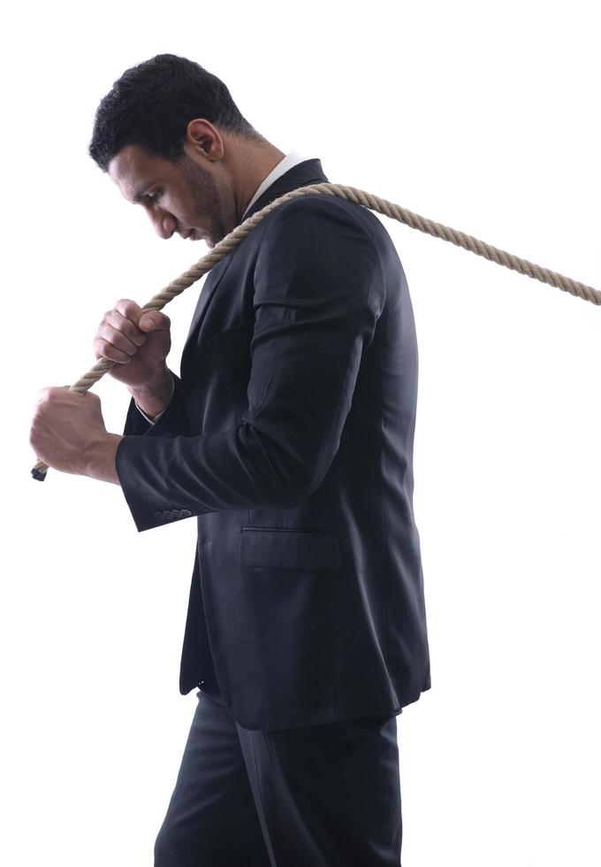 business man with rope isolated on white background photo