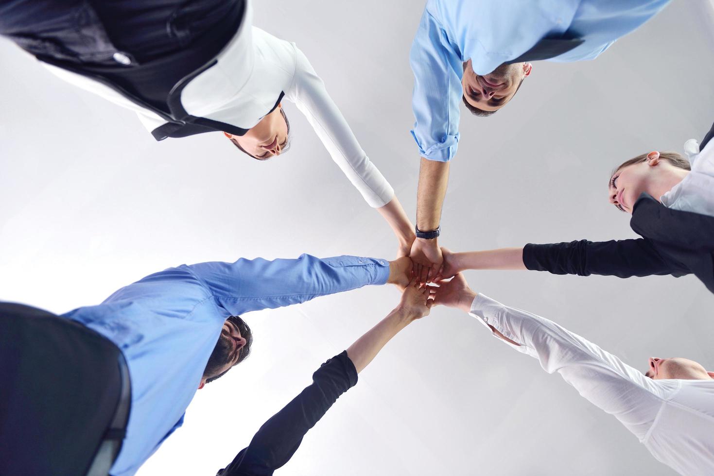 business people group joining hands photo