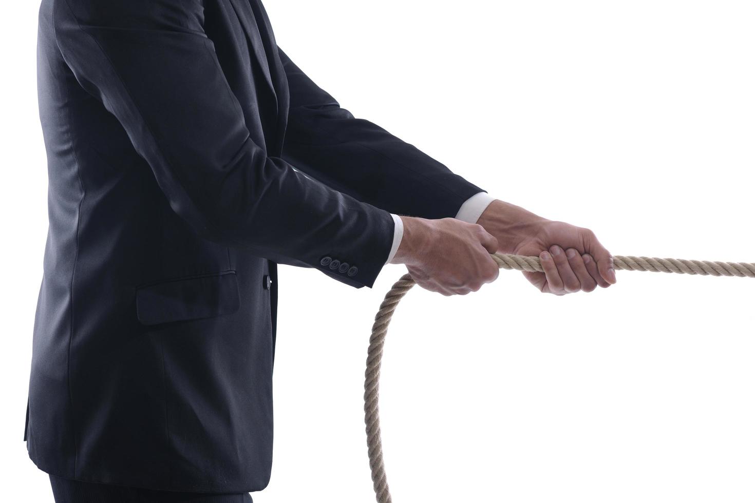 business man with rope isolated on white background photo