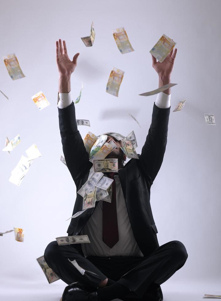 Business man holding money photo