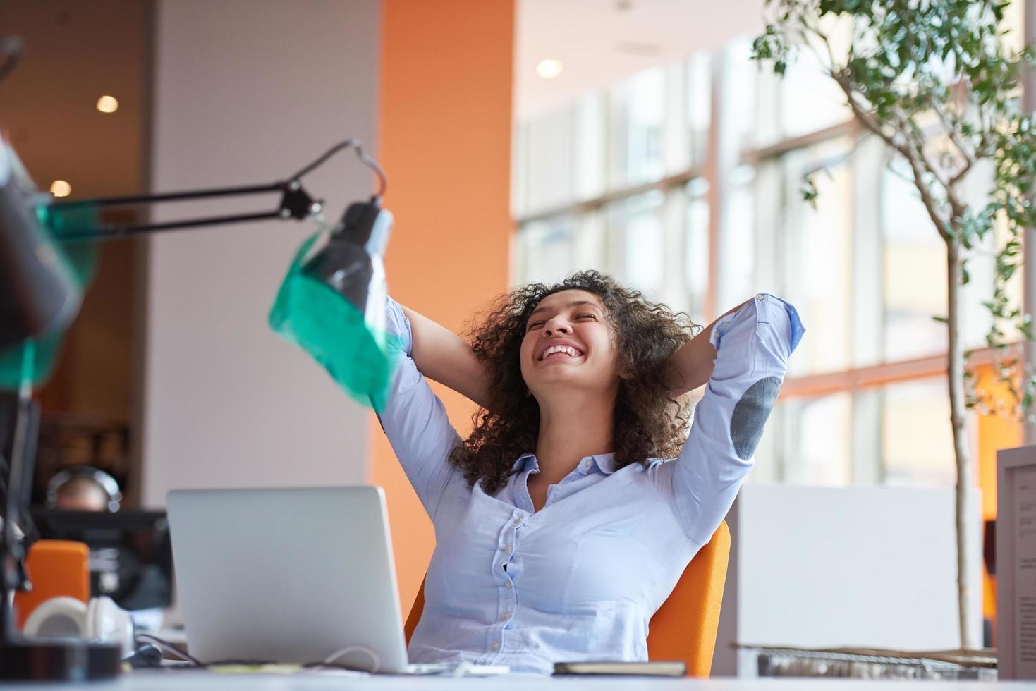 young  business woman at office photo