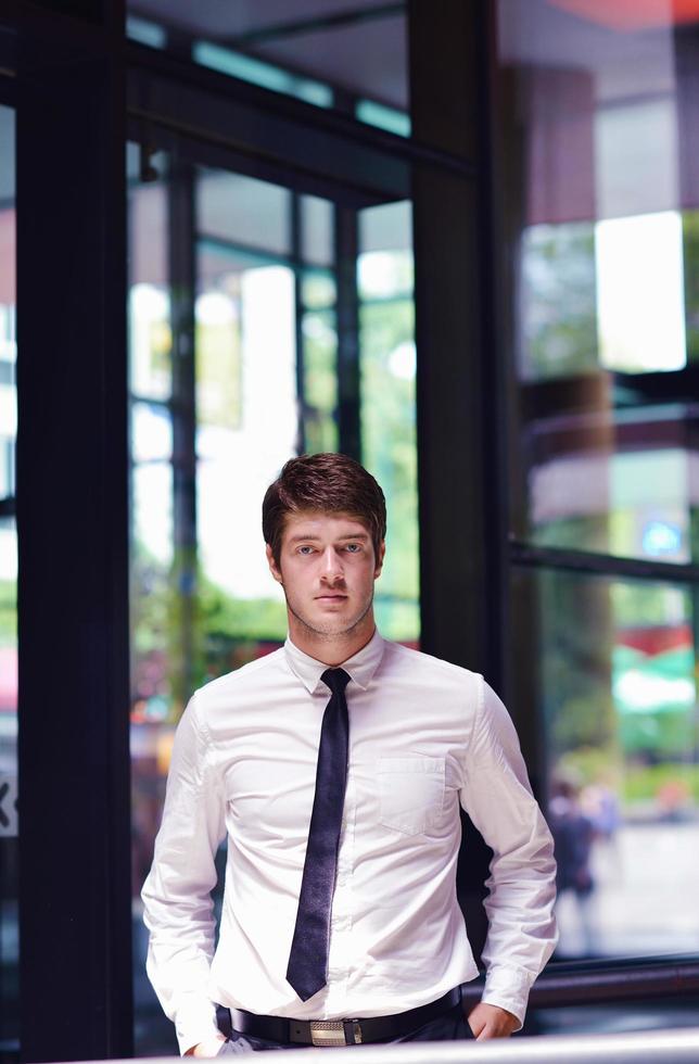 happy young business man at office photo