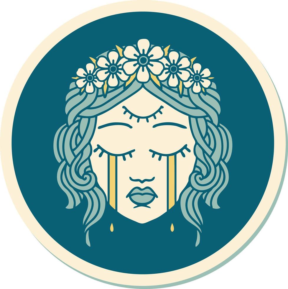 sticker of tattoo in traditional style of female face with third eye and crown of flowers cyring vector