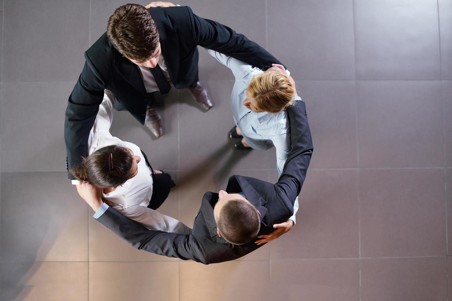 business people group joining hands photo