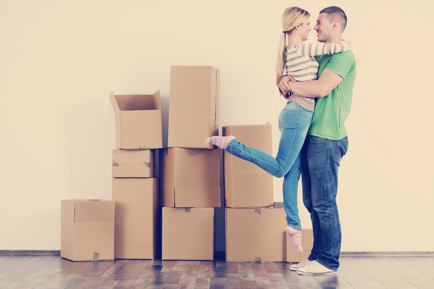 Young couple moving in new house photo